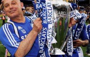 Ray Wilkins holds aloft Premier League trophy as Chelsea coach in 2010