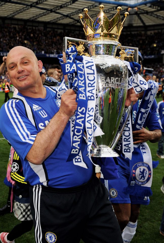 Ray Wilkins holds aloft Premier League trophy as Chelsea coach in 2010