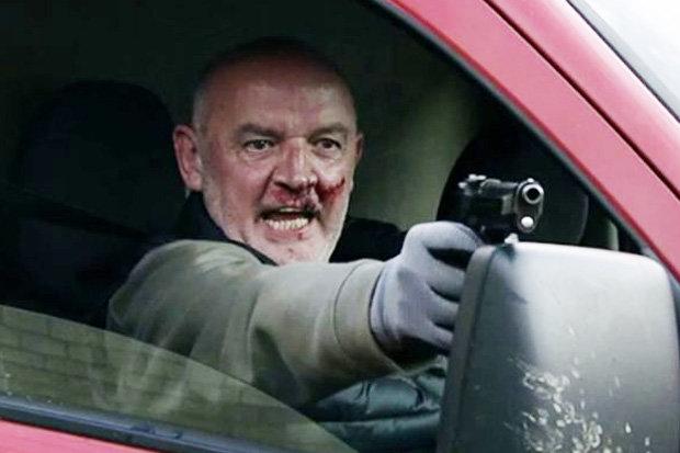 Pat Phelan with gun Coronation Street