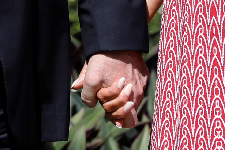 The pair were snapped holding hands in their first public appearance together since the wave of affair allegations 