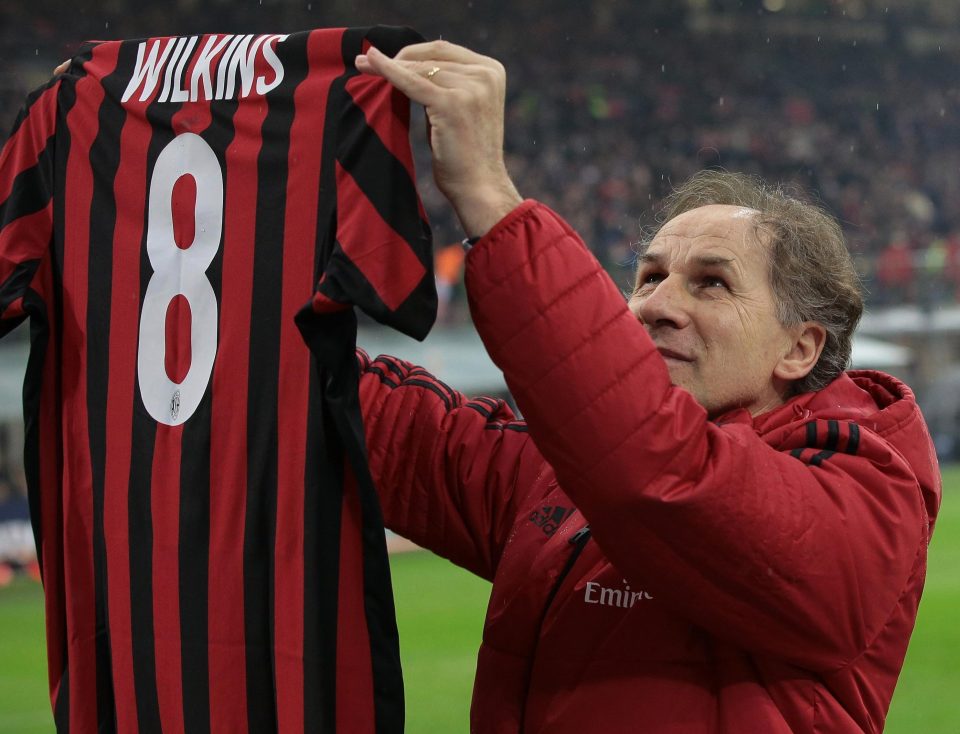 AC Milan fans stood up to applause as Franco Baresi holds up Ray Wilkins shirt