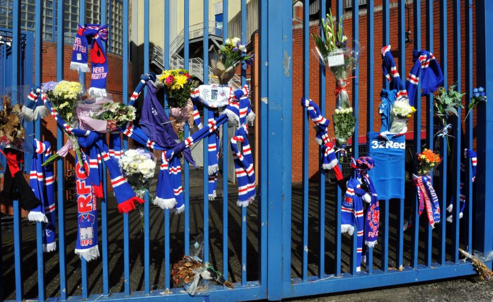  Rangers fans were keen to pin their tributes to the gate at Ibrox