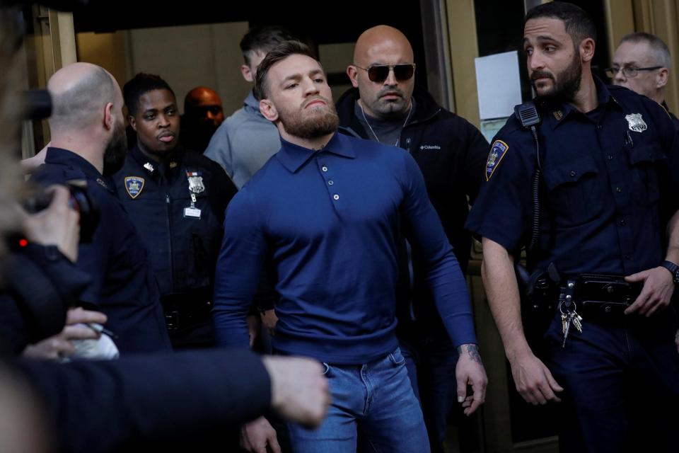  Conor McGregor exits court after posting $50,000 bail - he will return to court on June 14