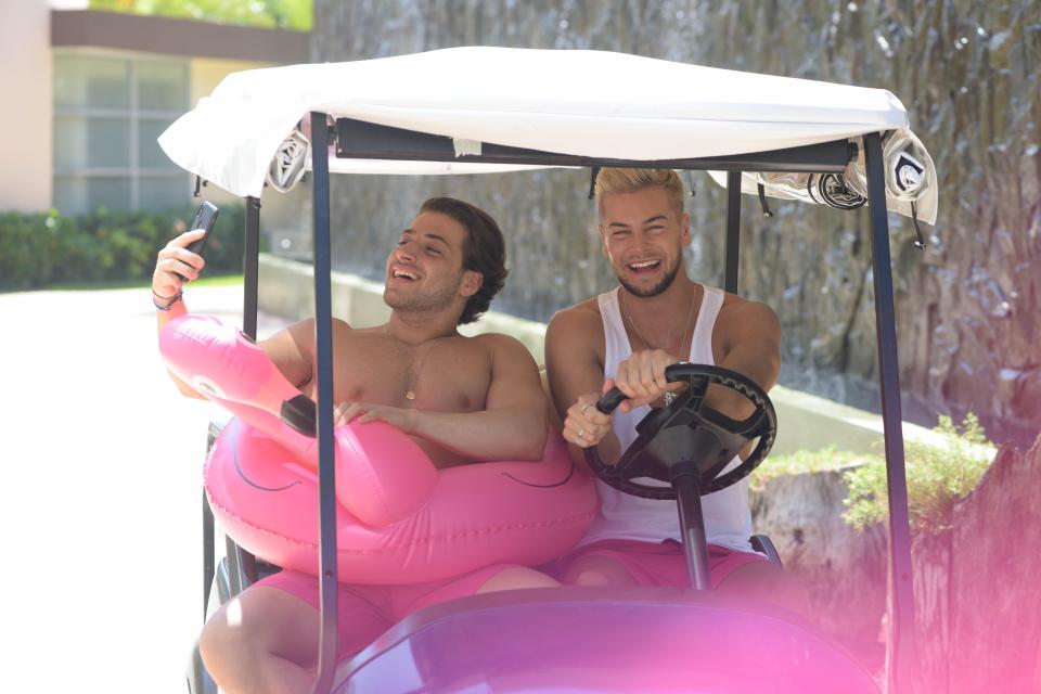  The pair had fun with an inflatable pink flamingo ring