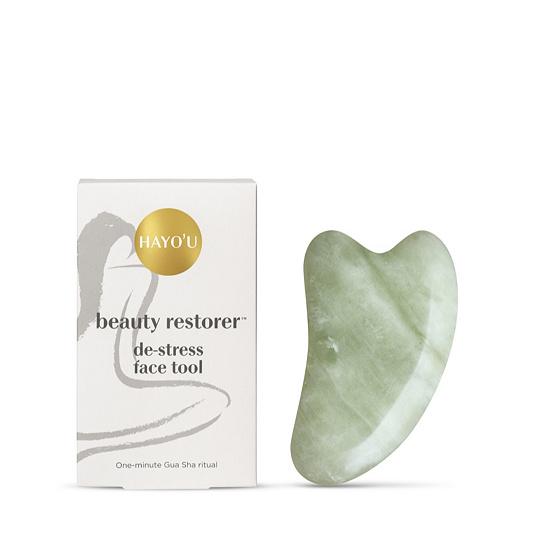  Hes taken to using trendy face massager The Hayo’u Beauty Restorer
