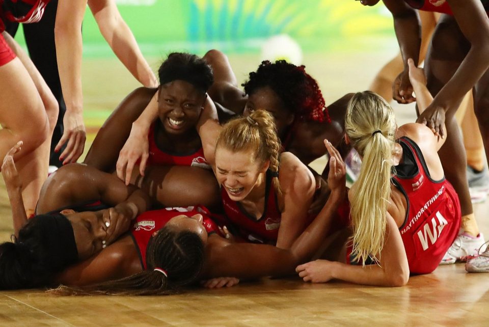 The England team celebrate after winning the Netball Gold Medal match at the Commonwealth Games against Australia