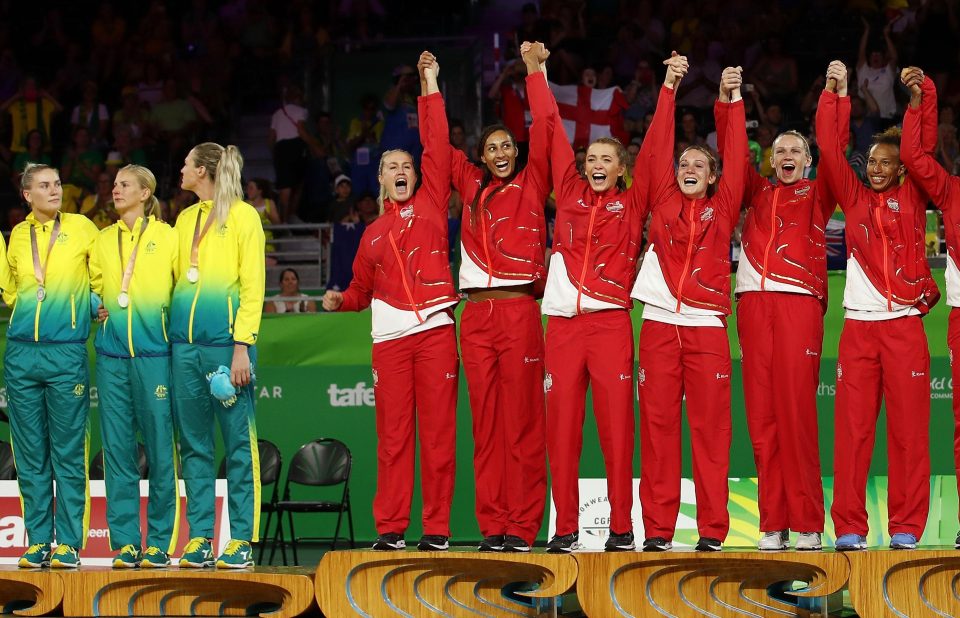 England's netballers celebrate after clinching historic gold medal