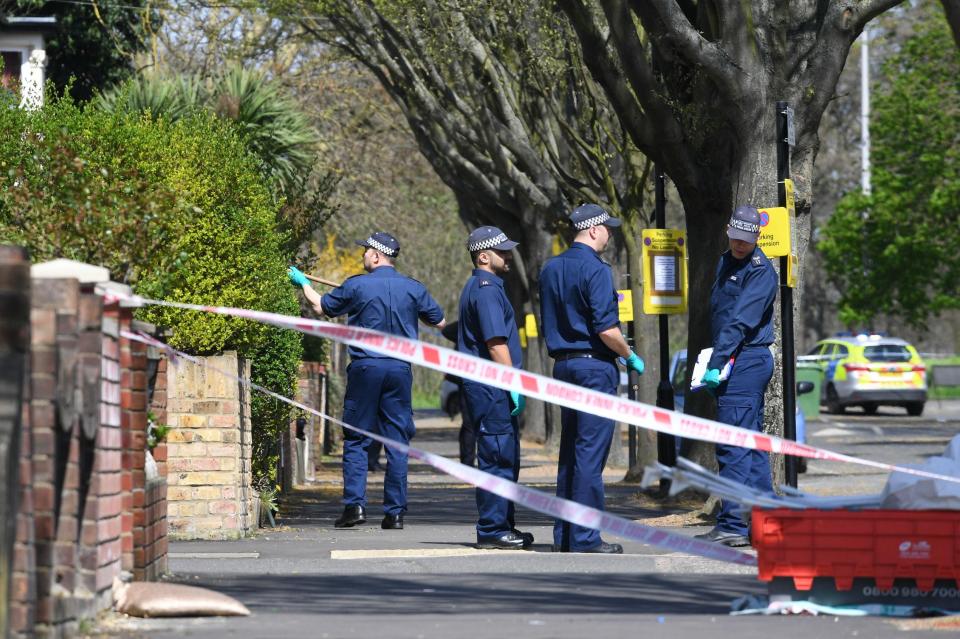  Forensic officers hunt for clues where the teen was murdered