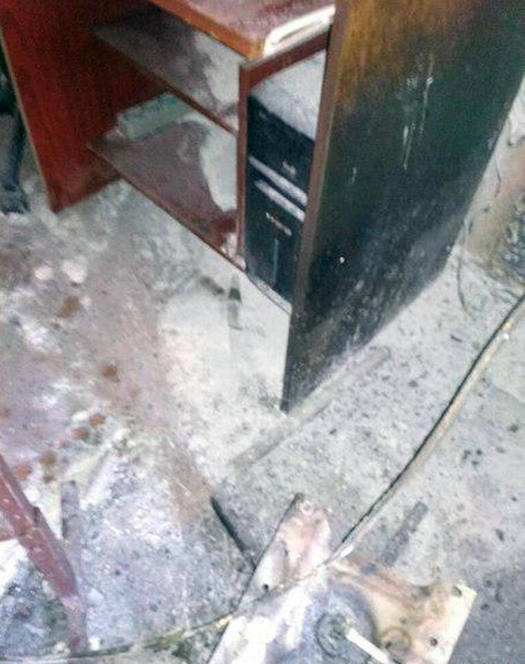 The charred remains of the classroom following the shocking incident 