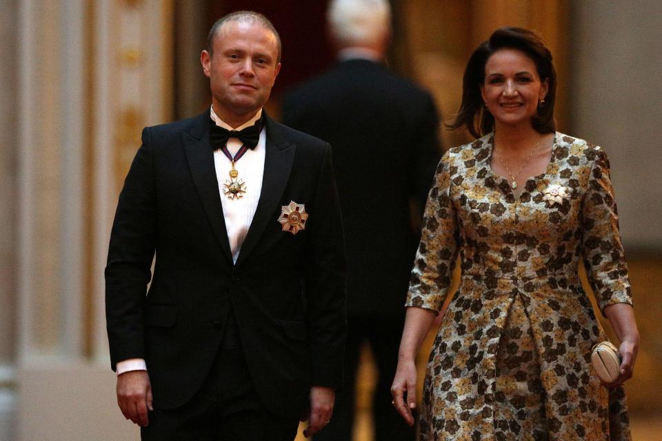  Malta's Prime Minister Joseph Muscat and his wife Michelle arrive to attend The Queen's Dinner