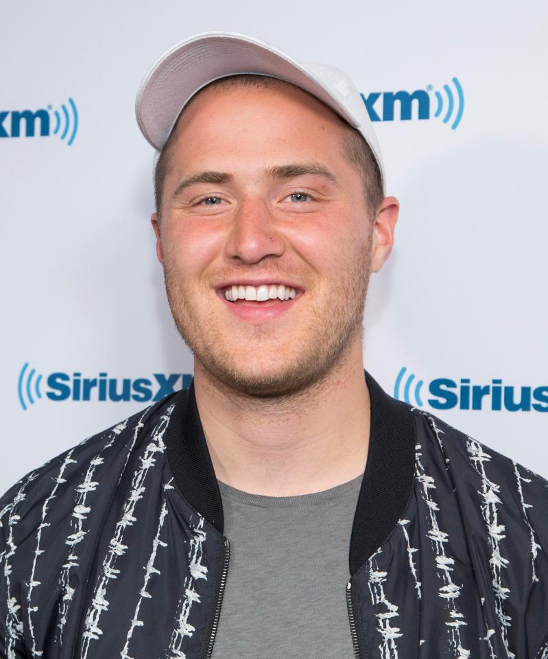  Mike Posner said he had been given a pill while watching Avicii play