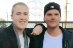 Mike and Avicii posing together behind-the-scenes at a video shoot