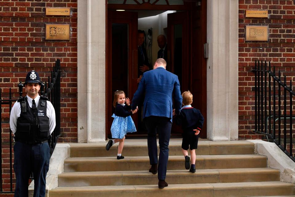 Princess Charlotte won over everyone with her cute wave as she walked up the steps with her family