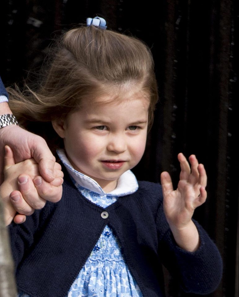 Two-year-old Charlotte appeared confident and at ease in front of the world's press