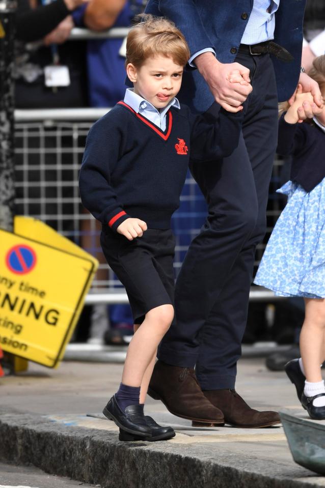 The four-year-old held on to his dad's hand earlier today