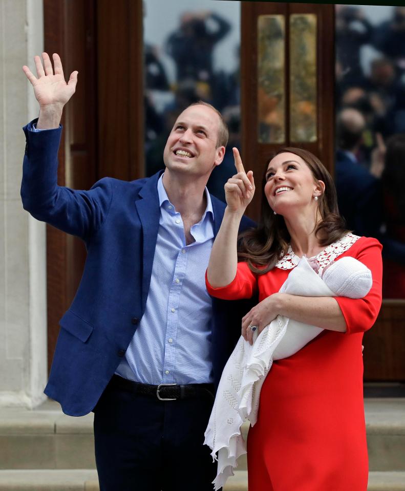  Wills and Kate wave and point to well-wishers