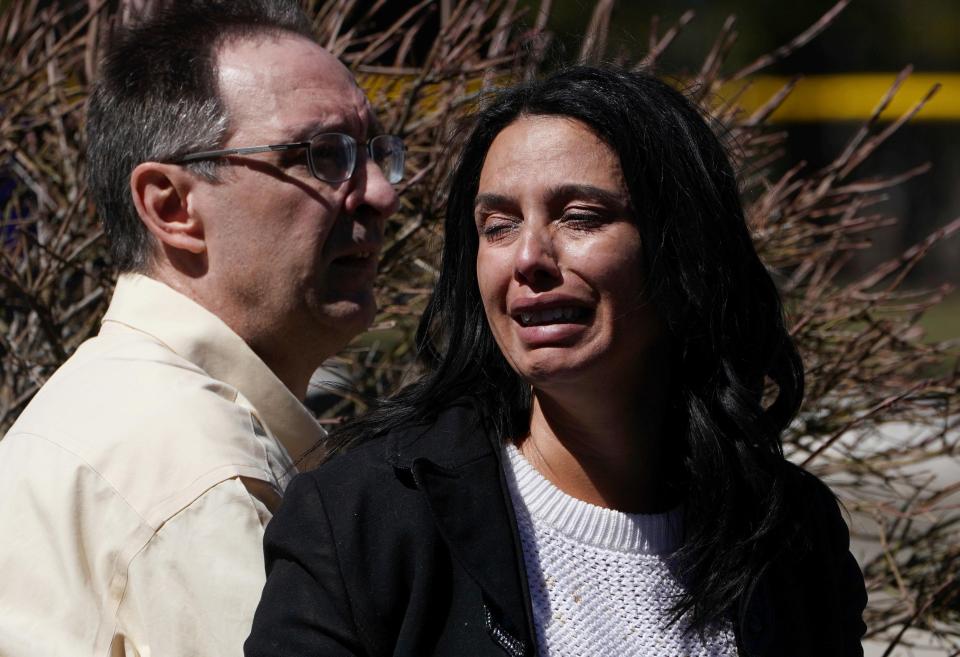 A woman cries after witnessing the van attack which left several dead 