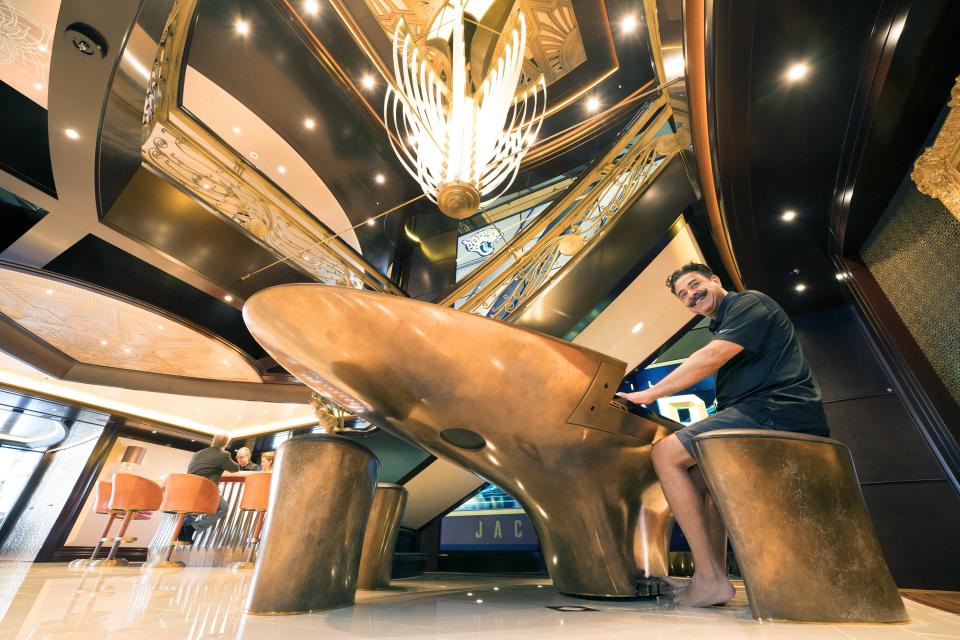 The Jaguars owner relaxing on his piano inside lavish boat