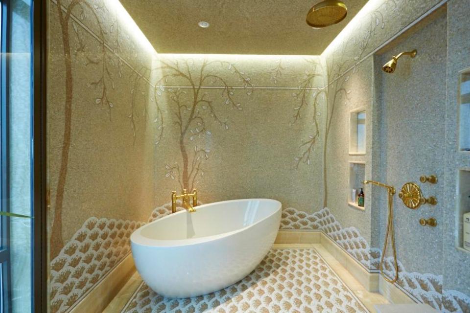  Shahid Khan's plush bathroom is modelled on the ancient spas in Pompeii after he completely remodelled his Chicago home