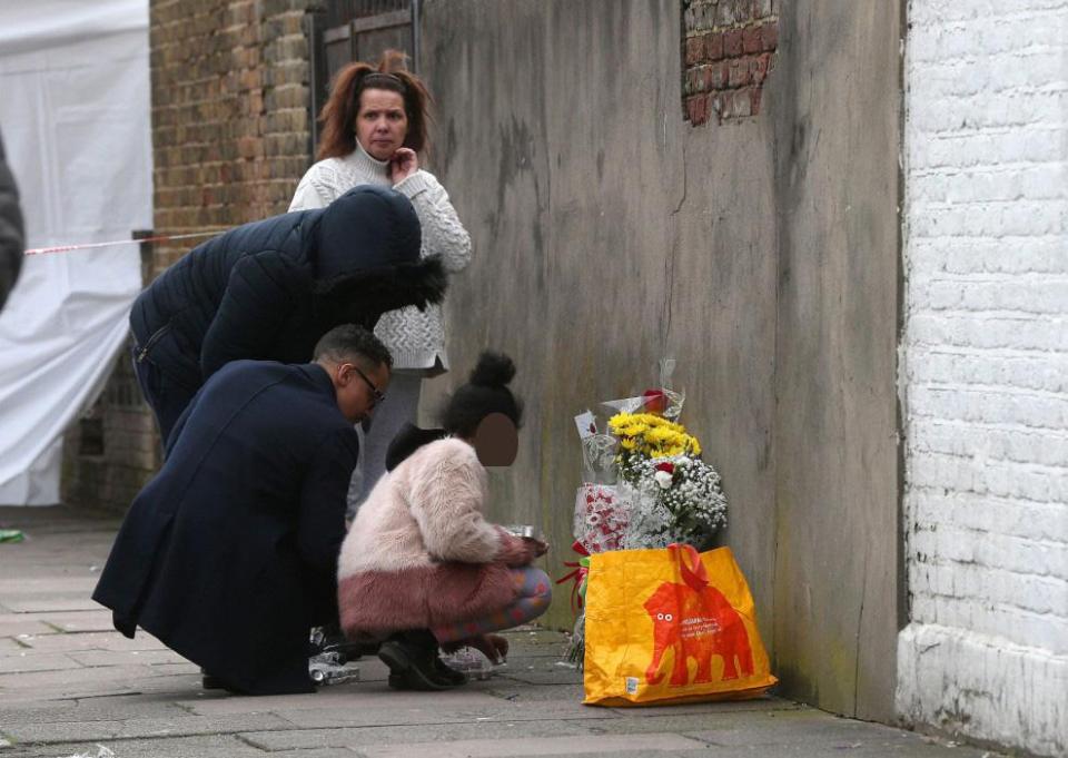 Floral tributes have been left at the scene