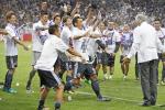 Japan players celebrate qualifying for Russia