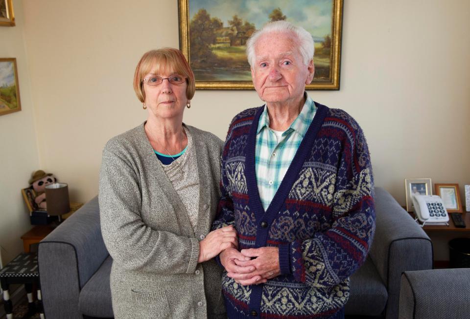  Mr Cullen, pictured here with wife Jean, said police officers pushed him to the ground and handcuffed him