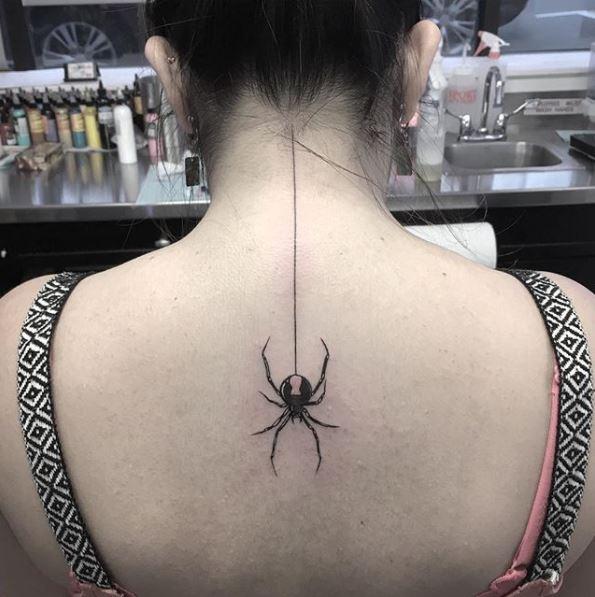 Not one for the faint hearted.... this black widow spider tattoo is by artist Justin Sandelli