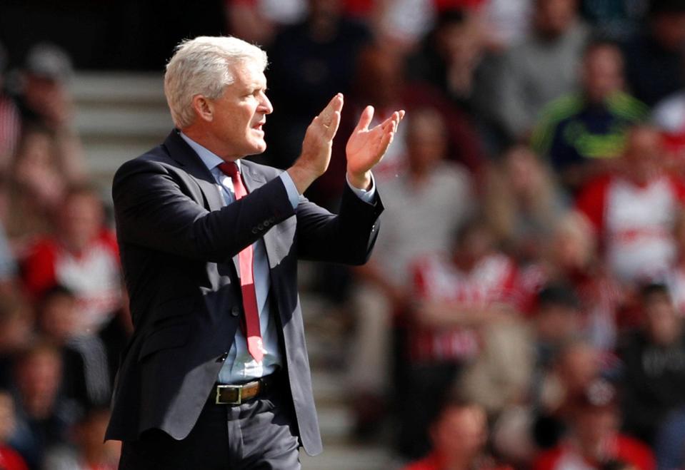 Mark Hughes was all smiles at the final whistle despite seeing his side lose