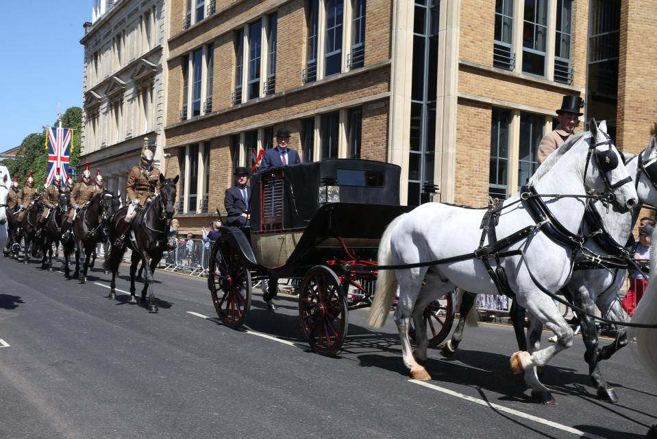  The royal carriage is pulled through the streets of Windsor during the rehearsal for the big day