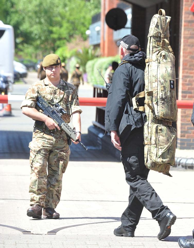 Armed cops were seen strolling around Windsor ahead of the Royal Wedding, with no expense spared