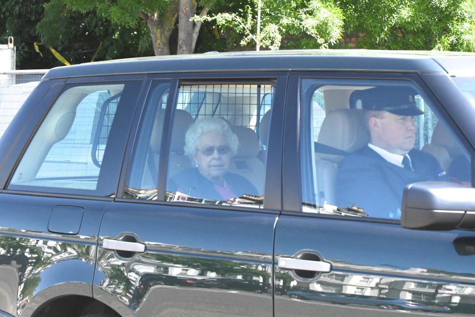  The Queen also took part in the rehearsal, pictured driving from London to Windsor yesterday