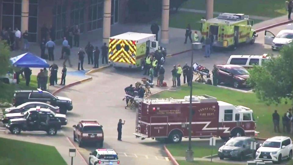 Emergency vehicles parked outside the campus which was on lockdown for much of the morning