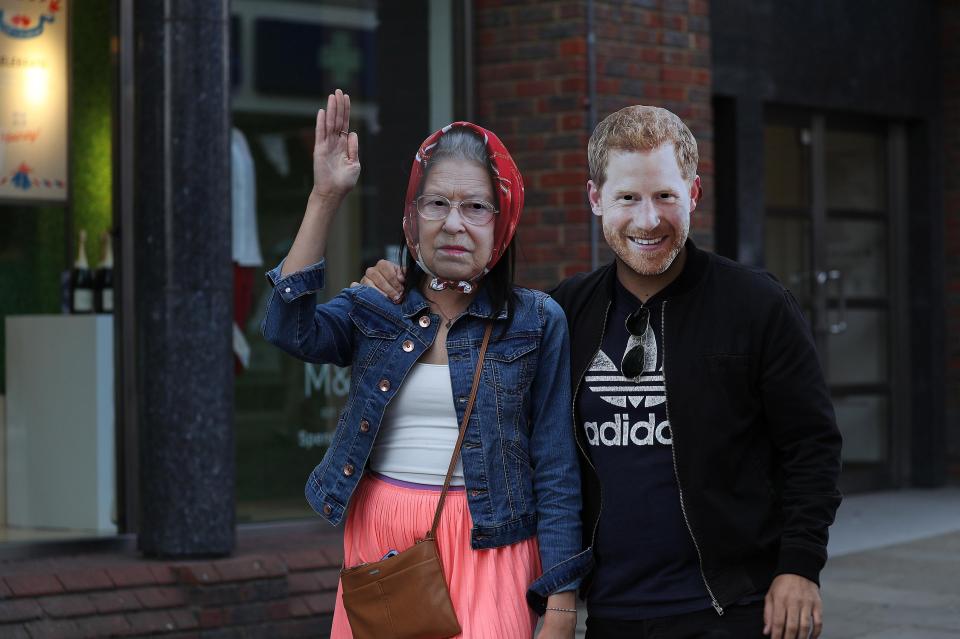  Many fans past the time by messing around in novelty masks
