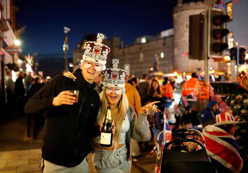  Hundreds of Royal well-wishers packed the streets of Windsor in fancy dress as they clamoured for front-row seats to today's festivities