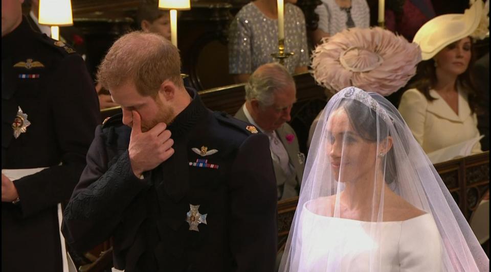 The young royal reached up and wiped his eye as he stood next to his beaming bride