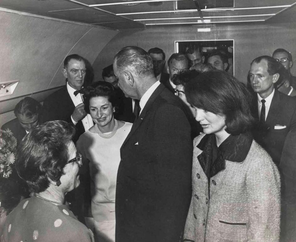 Jackie Kennedy was pictured after her husband's assassinations, with some blood splatters appearing to be visible in this photograph