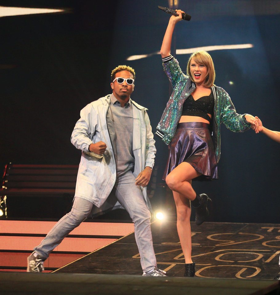 Swift with Toshi, right, performing in Shangai, China, as part of her 1989 tour, in 2015