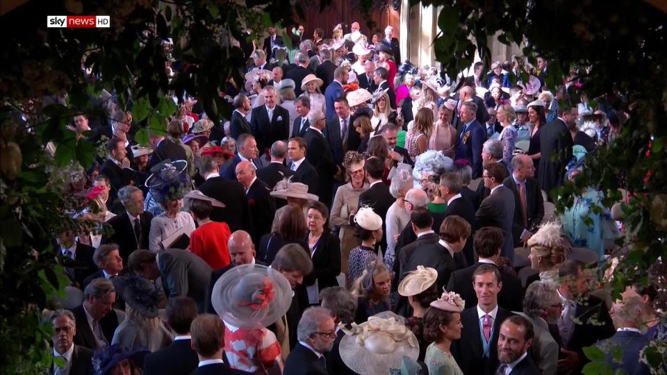 The chapel has begun to fill with the hundreds of guests