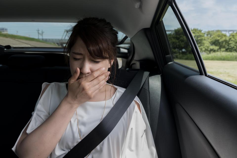  Sitting in the back seat can bring on the feeling of motion sickness