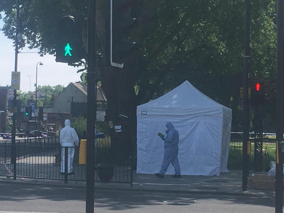  Cops hunt for clues at the scene of the North London stabbing
