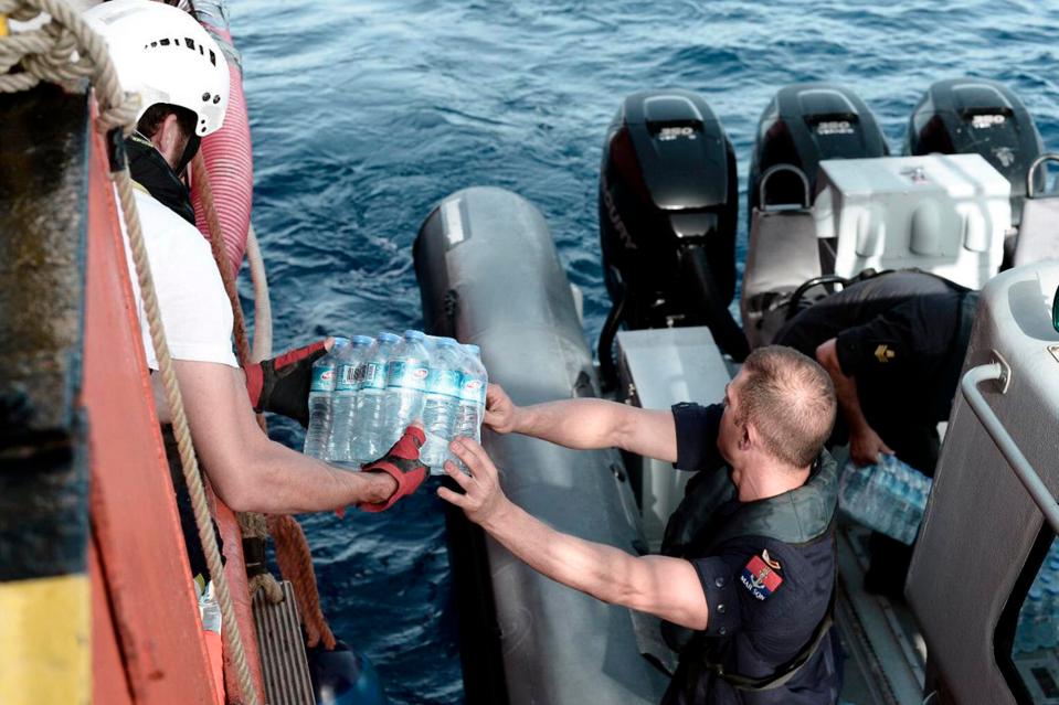 Italy sent supplies to the stranded migrants it refused to allow ashore