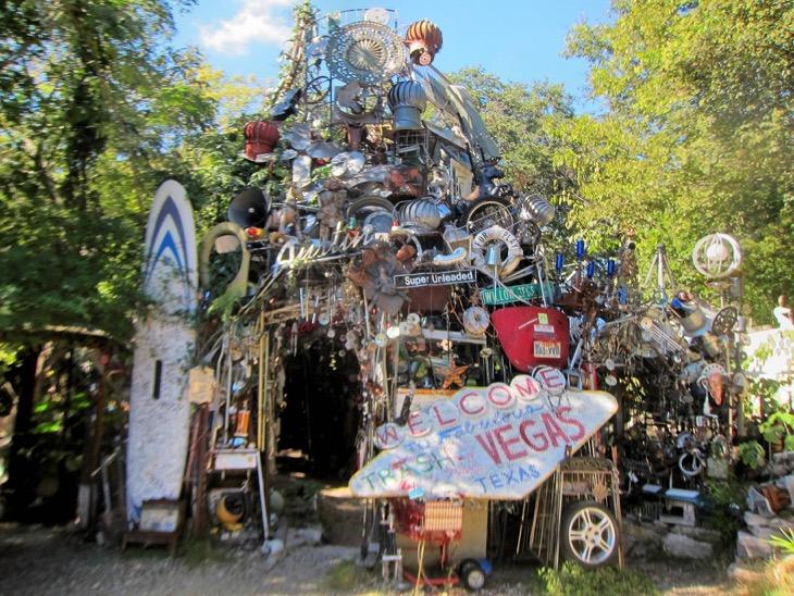Theres even a park handed over to graffiti artists and a three-storey, 60-ton Cathedral of Junk made from hubcaps, motorbikes, computers, TVs and hundreds of bicycles