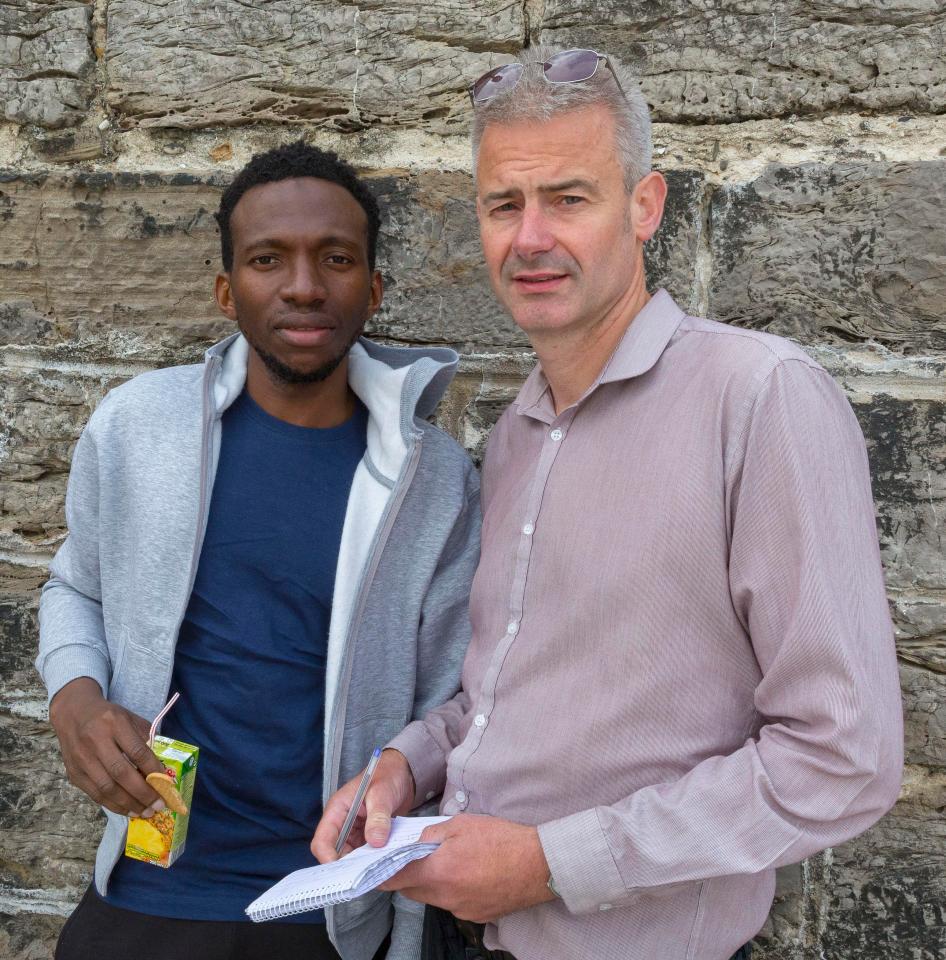  Student Sory Sang, 23, from Guinea who was picked up by the Spanish rescue boat after attempting the crossing from Morocco with The Sun's Robin Perrie