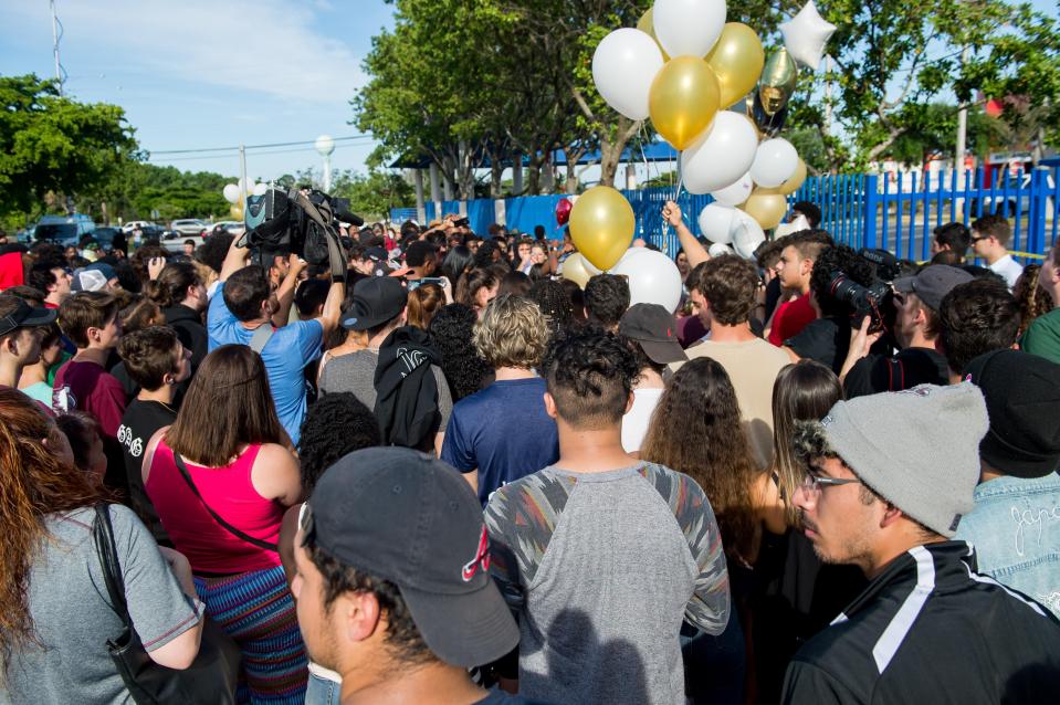  Fans gathered outside the motorcycle shop in Miami to pay tribute to the rapper a day after he died