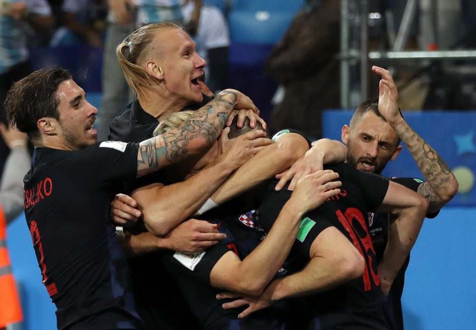  Croatia celebrate going ahead through Ante Rebic in 3-0 thumping of Argentina