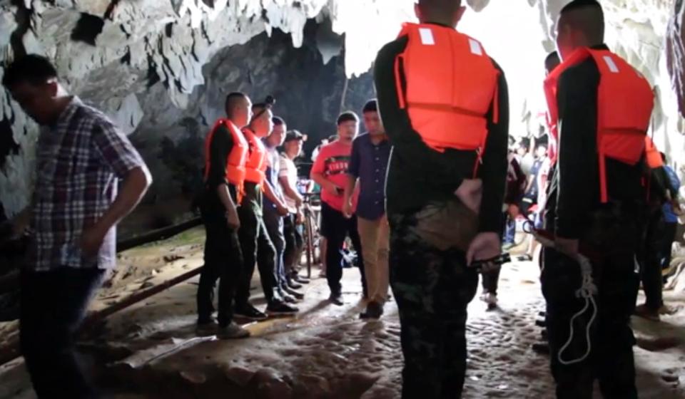  Rescuers prepare to enter the cave system in Chiang Rai, Thailand, where the boys are believed to be trapped