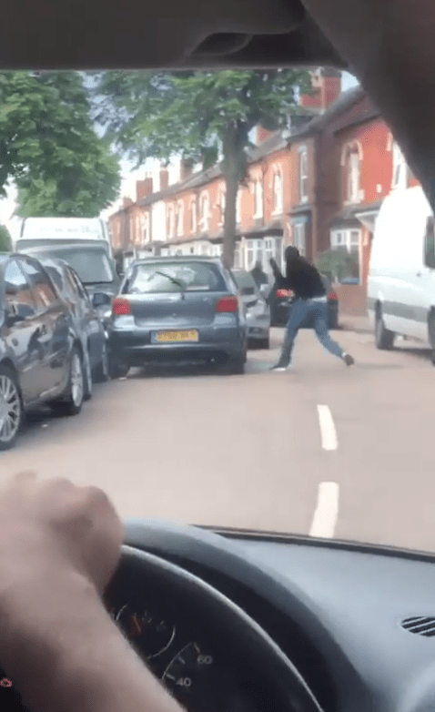  One of the masked men then got out of the BMW and started smashing up the vehicle with a machete