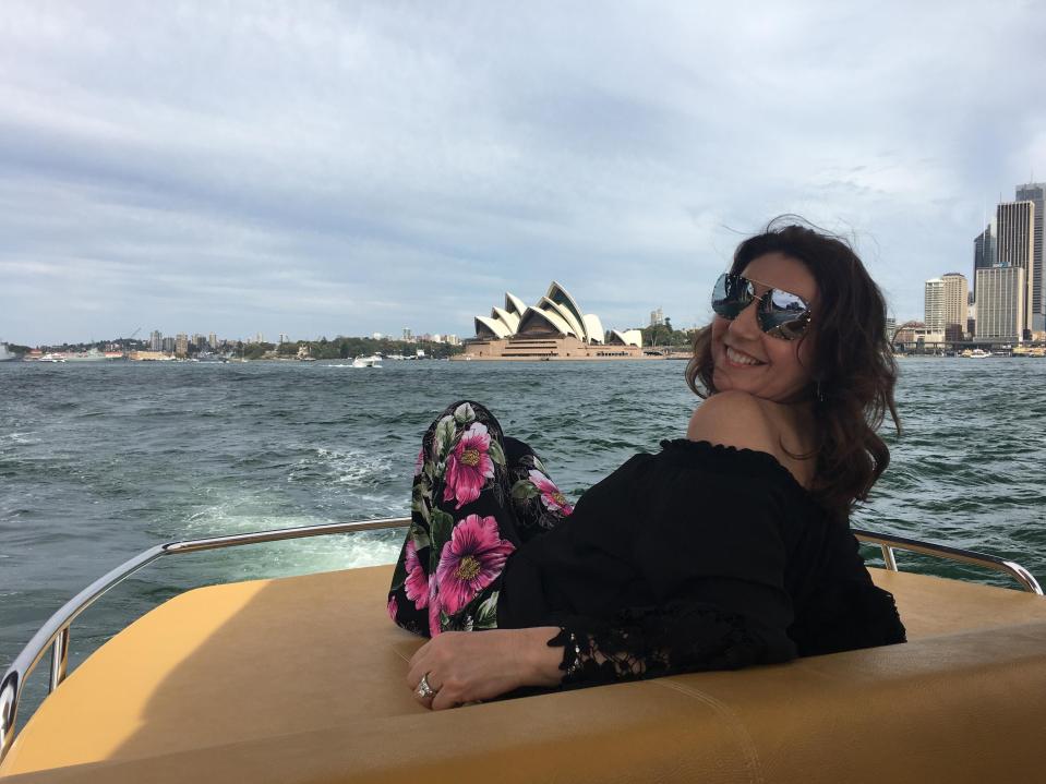 Jane relaxes on a boat in Sydney Harbour during filming for her hit show