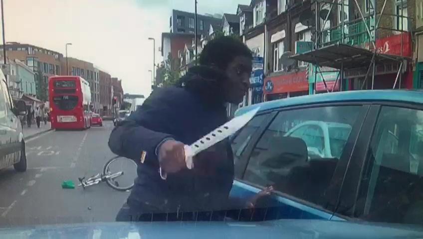 A cyclist armed himself with a huge knife in the road rage row in Croydon