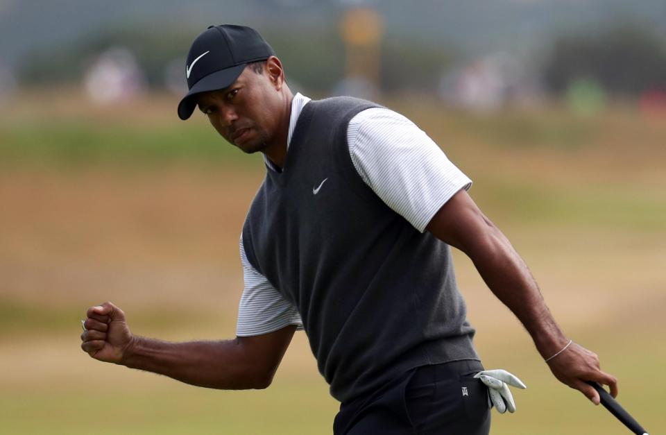  Tiger Woods lit up Carnoustie as he surged into contention